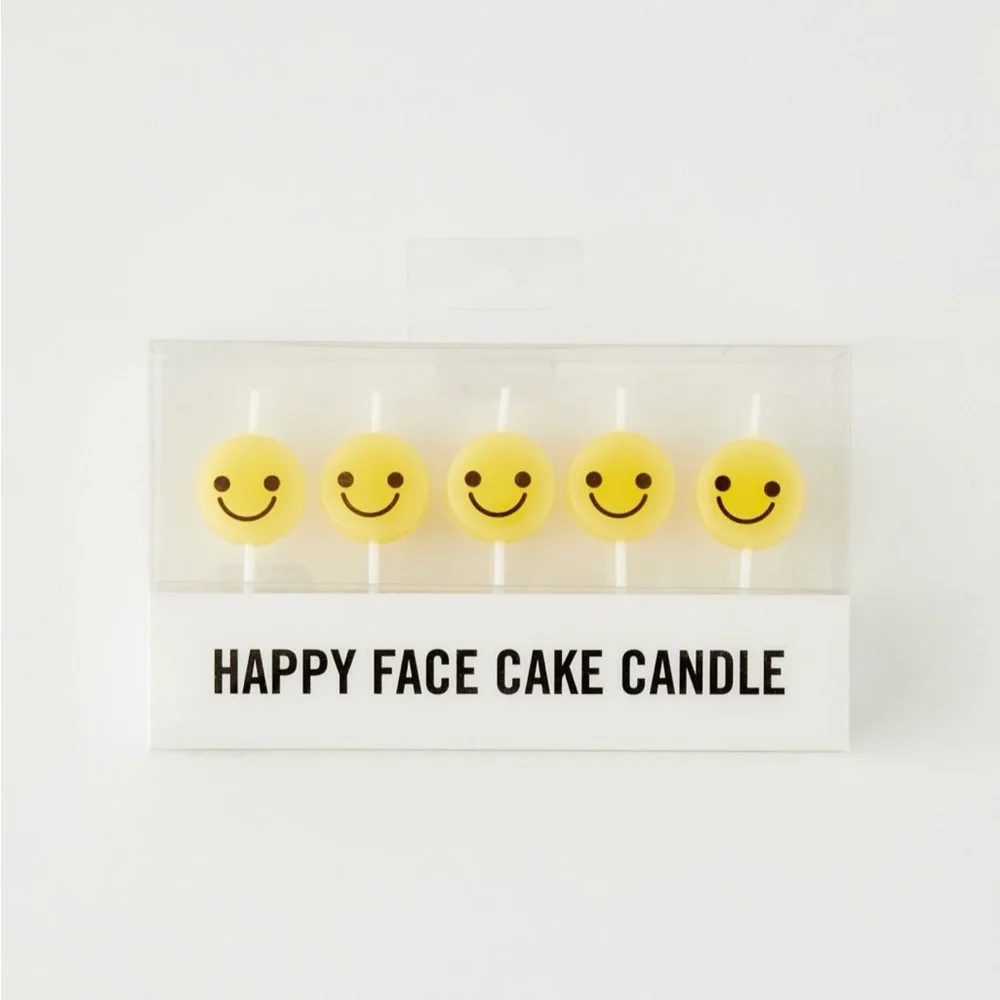 UO Happy face cake candle set